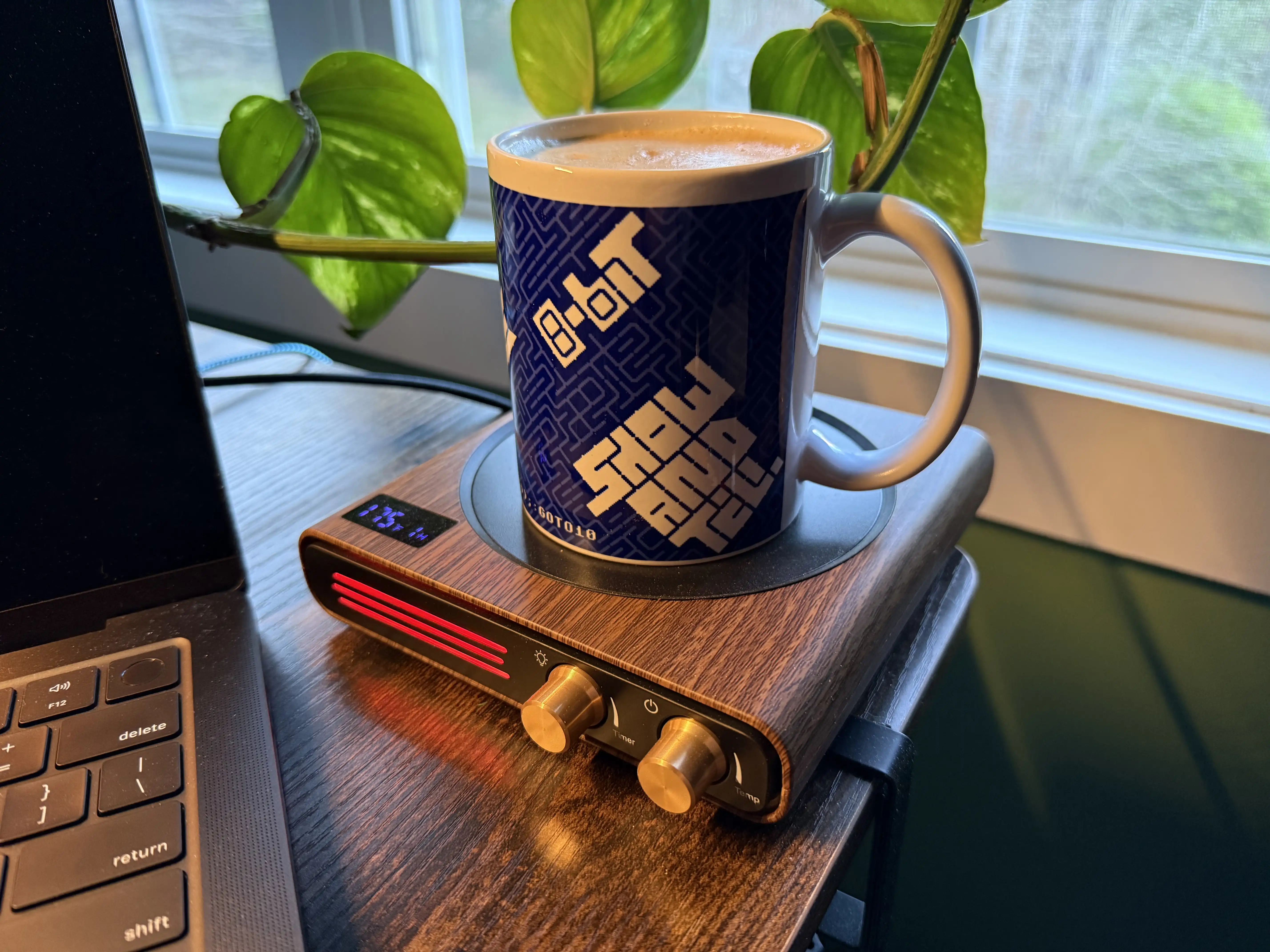8-Bit Show and Tell mug on a mug warmer